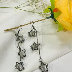 Long star shaped earring