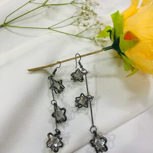 Long star shaped earring